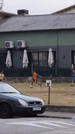 Summer evening in Sant Joan Les Fonts — dogs, kids, and gardens