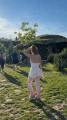 Visitors explore whimsical themed park attractions in Lukovit, Bulgaria