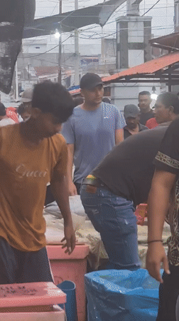 Evening market activity captured in Lhokseumawe, Indonesia