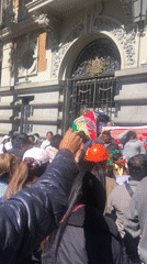 Political demonstration draws crowds to government building in La Paz