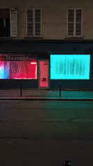Massage establishment documented in nighttime Paris street view
