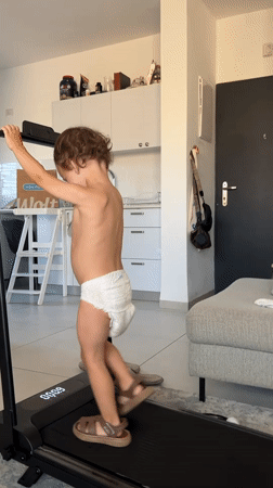 Toddler walks on home treadmill in Kiryat Bialik