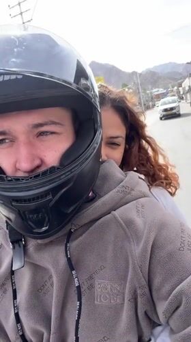 Motorcycle selfie and historic monument at a Leh roundabout