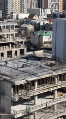 Morning moments captured across Tbilisi: construction, breakfast, city views