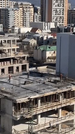 Morning moments captured across Tbilisi: construction, breakfast, city views