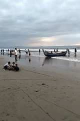 Net hauling and beachside play at dusk in Uleekareung