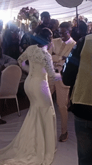 Wedding couple dances at reception in Barakin Akawo, Nigeria