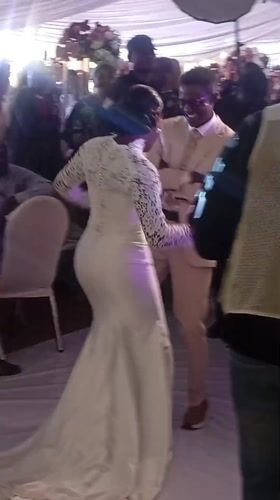 Wedding couple dances at reception in Barakin Akawo, Nigeria