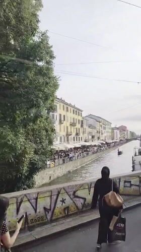 Witnesses document ordinary Milan street life during afternoon hours