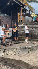 Morning beach life unfolds in North Kuta with music and swimming