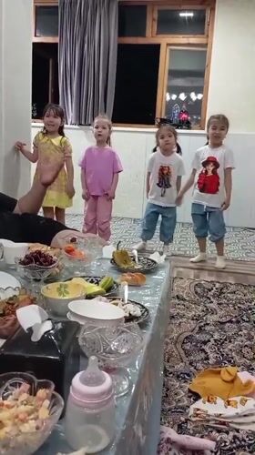 Family meal gathering captured in Bekabad home