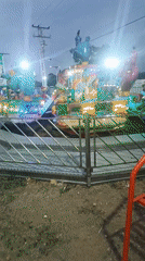 Children's carnival ride operates at night in Tinaquillo