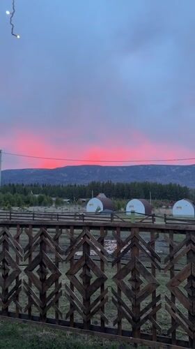 Rural Russian village life: dog feeding, sunset, family moments