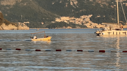 Boats gather in calm waters off Budva coast