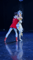 Classical ballet performance on a dramatic lit stage in Ufa