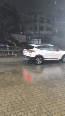 Heavy rain floods parking areas in Tashkent