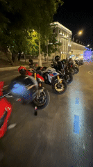 Motorcycles lined up on Moscow street during evening hours