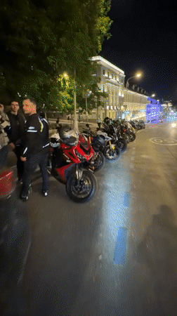 Motorcycles lined up on Moscow street during evening hours