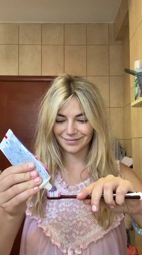Morning bathroom routine with a fluffy dog in Budva