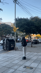 Evening sidewalk activity captured across Buenos Aires neighborhood