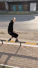 Rollerblade rail tricks filmed on a Kansk sidewalk