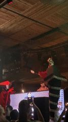 Costumed performer and DJ light up Burgas nightclub