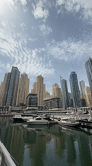 Dubai waterfront and urban scenes documented during sunny morning