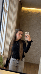 Woman Takes Mirror Selfies in Klin, Russia
