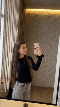 Woman Takes Mirror Selfies in Klin, Russia
