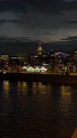 Moscow riverbank cityscape captured at dusk
