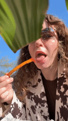 Woman enjoys outdoor meal in Moscow