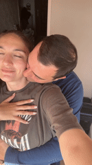 Intimate moments between couple captured in Sochi indoor setting