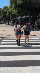 Barcelona morning scenes: pedestrians, statue, tower, rugby field documented