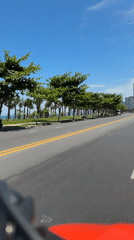 Morning traffic flows along coastal road in Đà Nẵng