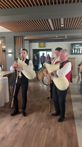 Traditional musicians perform at restaurant celebration in Karlovo, Bulgaria