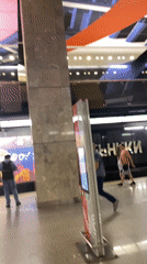 Bold geometric ceiling art inside a modern metro station