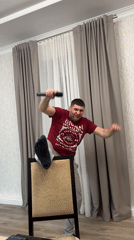 Man dances, dines with terrier dog in Russian home