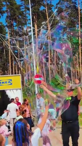 Street performers draw crowds with soap bubble shows in Latvia