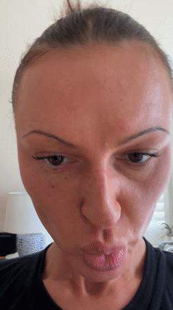 Woman records video on iPhone in Tunbridge Wells