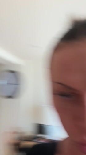 Woman records video on iPhone in Tunbridge Wells