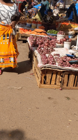 Morning markets active across Moshi, Tanzania selling produce and goods