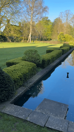Morning stroll through formal garden in East Suffolk
