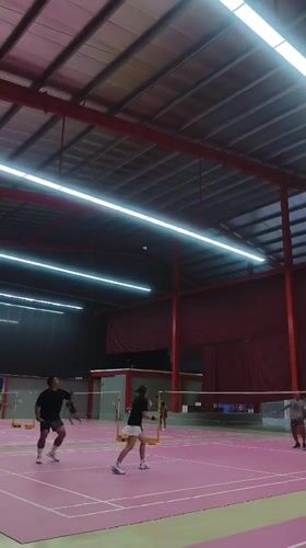 Recreational badminton matches observed at Ko Samui sports facility
