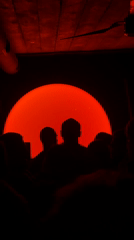 Nightclub scene with red lighting captured in Tbilisi