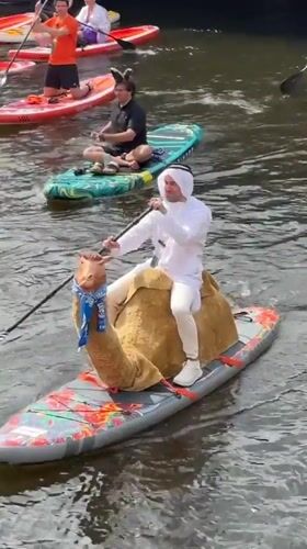 Saint Petersburg street scenes, a canal bridge, and a camel paddleboarder