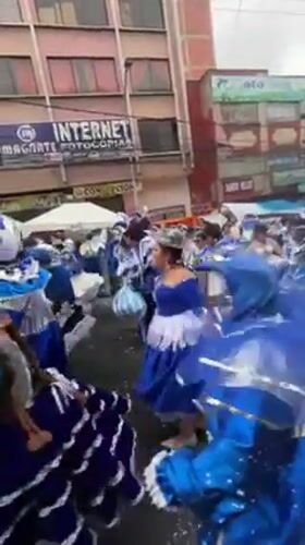 Traditional Andean dancers parade through La Paz streets in colorful celebration