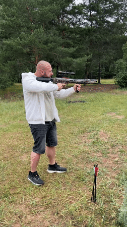 Crossbow target practice in a grassy outdoor spot near Noviy