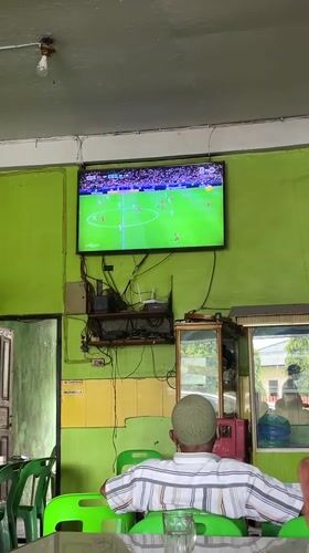 Coffee and football on a quiet morning in Manyang Cut