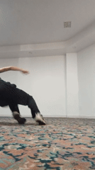 Woman performs gymnastics routine in Porlamar resort room