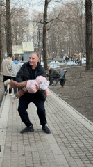 Families gather at Klin playground during spring afternoon